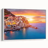 Framed canvas wall art showcasing a serene village landscape design, featuring vibrant colors and intricate details, displayed from a white side view. Perfect for home decor.