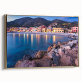 Framed canvas wall art showcasing a picturesque village landscape design with vibrant colors and gold accents, perfect for enhancing home decor and ambiance.