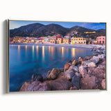 Framed canvas wall art collection showcasing a serene village landscape with soft pastel hues, featuring silver accents and a side view for elegant display. Perfect decor for enhancing home aesthetics.