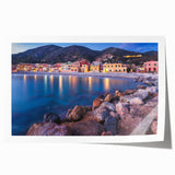 Rolled print showcasing a vibrant landscape of a quaint village, featuring lush greenery and colorful houses, ideal for home decor and art enthusiasts.