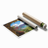 Rolled print showcasing a vibrant village landscape design, featuring lush greenery and colorful houses, perfect for home decor. Packaged securely in a protective tube.