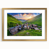 Framed wall art collection showcasing a serene village landscape design with a gold mat, perfect for adding elegance to home decor, enhancing aesthetic appeal.