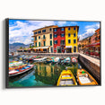 Framed canvas wall art showcasing a picturesque village landscape with vibrant colors, perfect for home decor. Features a sleek black frame and side view display.