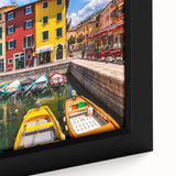 Framed canvas wall art showcasing a vibrant village landscape design with rich colors and intricate details, perfect for enhancing home decor.