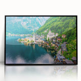 Framed acrylic wall art featuring a vibrant landscape of a picturesque village, designed with rich colors and intricate details, set against a sleek black frame.