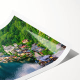 Rolled print showcasing a vibrant landscape scene with colorful village homes and lush greenery, ideal for home decor and art enthusiasts.