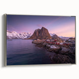 Framed wall art collection showcasing a serene landscape of a village, featuring intricate details and vibrant colors, complemented by a sleek silver frame.