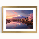 Elegant gold-framed wall art showcasing a picturesque village landscape design, complete with a mat for added depth, ideal for enhancing home decor aesthetics.