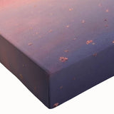 Close-up of a vibrant stretched canvas wall art piece showcasing a serene village landscape, featuring lush greenery and a tranquil sky, perfect for home decor.