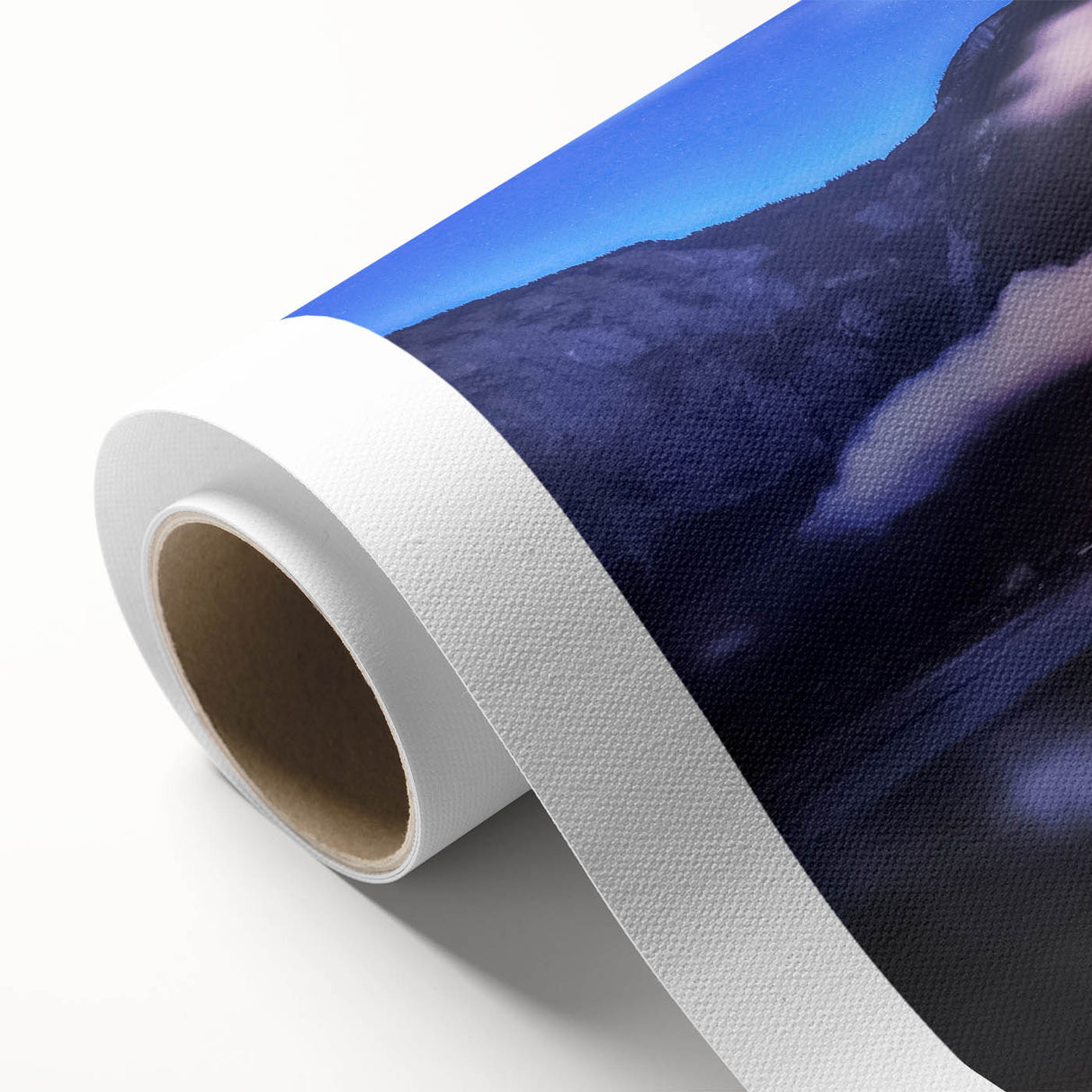 Rolled canvas wall art showcasing a picturesque village landscape with vibrant colors and intricate details, presented in a protective cardboard tube for safe shipping.