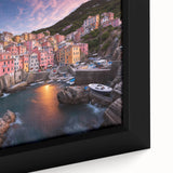 Framed canvas wall art showcasing a vibrant village landscape design with intricate details, perfect for home decor. Ideal for art lovers and interior designers.