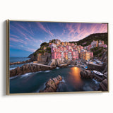 Framed canvas wall art showcasing a serene village landscape design with golden accents, elegantly displayed in a side view to highlight its artistic details.