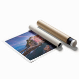 Rolled print showcasing a vibrant landscape village design in earthy tones, ideal for home decor, and carefully packaged in a protective cardboard tube.