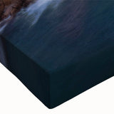 Close-up of a vibrant stretched canvas featuring a picturesque village landscape design, showcasing rich colors and intricate details perfect for home decor.