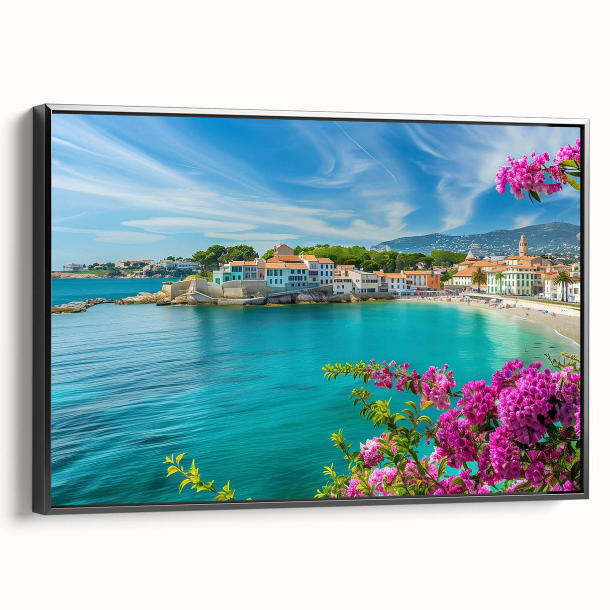 Framed landscape wall art showcasing a charming village scene with vibrant colors and intricate details, presented in a sleek black frame for modern decor.