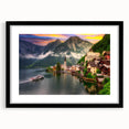 Framed wall art collection depicting serene village landscapes in a sleek black frame with a mat, perfect for enhancing home decor with a touch of elegance.