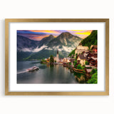 Framed wall art collection featuring serene landscapes and charming village scenes, elegantly presented with a gold mat, ideal for enhancing home decor.