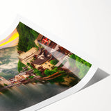 Rolled print of a vibrant landscape village design featuring warm colors and intricate details, suitable for home decor, showcasing artistic craftsmanship.