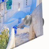 Close-up of a vibrant acrylic glass wall art piece showcasing a serene landscape with quaint villages, perfect for home decor and enhancing interior aesthetics.