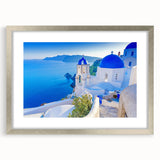 Framed silver wall art showcasing a scenic village landscape, featuring vibrant colors and intricate details, perfect for enhancing home decor.