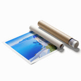 Rolled print showcasing a serene landscape village design, featuring vibrant colors and intricate details, perfect for home decor and artistic expression.