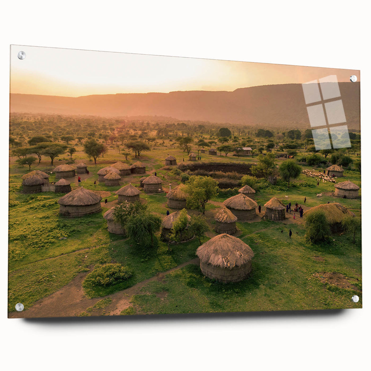 Acrylic glass wall art collection depicting vibrant village landscapes, showcasing rich colors and intricate details, elegantly framed with pins for display.