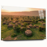 Acrylic glass wall art collection depicting vibrant village landscapes, showcasing rich colors and intricate details, elegantly framed with pins for display.