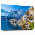 Vibrant acrylic glass wall art showcasing a picturesque village landscape, featuring rich colors and intricate details. The artwork is elegantly displayed with pins, perfect for modern decor.
