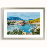 Framed silver wall art featuring a picturesque landscape and village scene, elegantly matted, perfect for home decor and enhancing interior aesthetics.