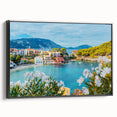 Framed canvas wall art collection showcasing a serene landscape with charming villages, featuring a sleek black frame and side view, perfect for home decoration.