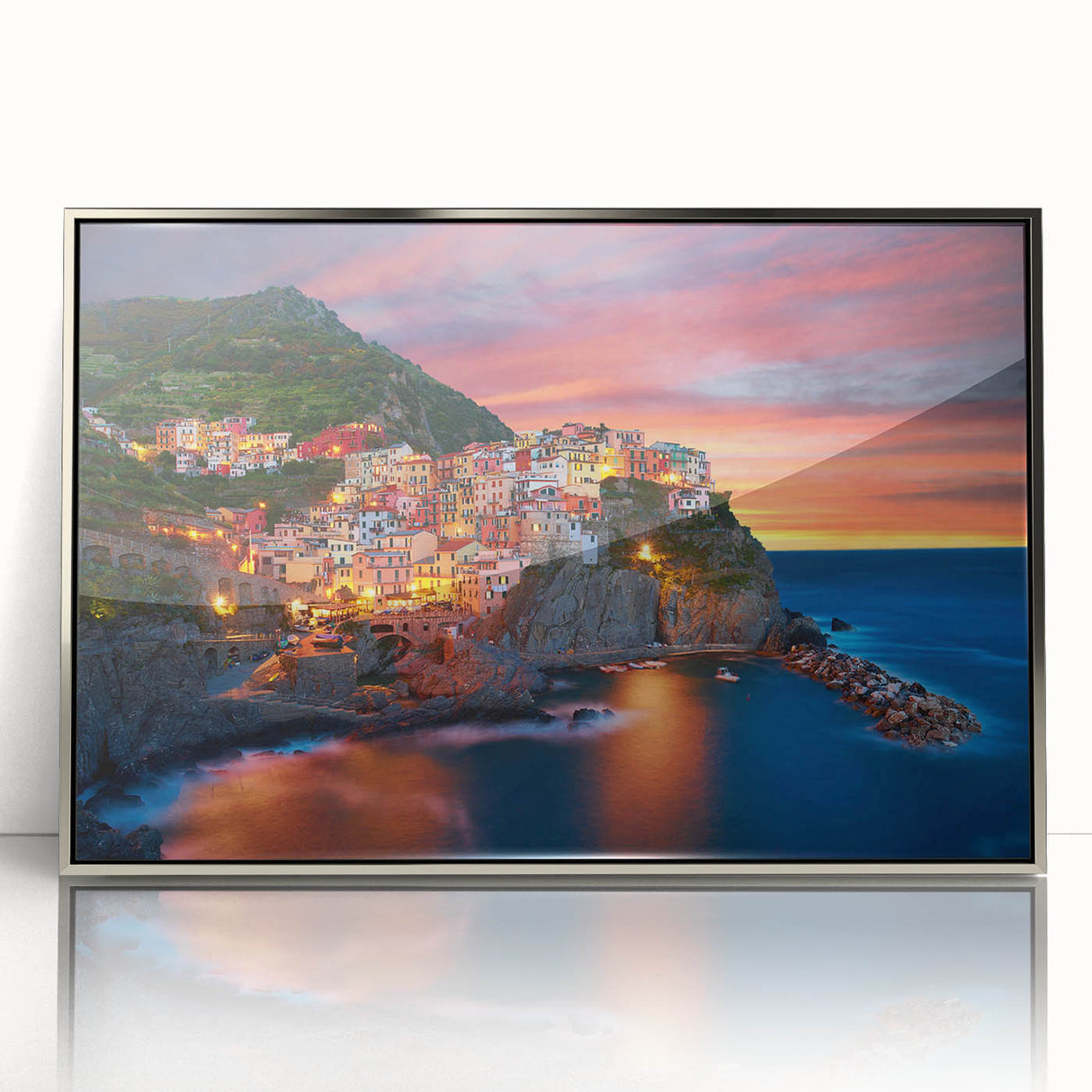 Framed acrylic wall art featuring a vibrant landscape design with serene villages, highlighted by a silver frame, ideal for modern home decor.