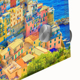 Close-up of a stunning acrylic wall art piece showcasing vibrant landscapes and charming villages, highlighting intricate details and vivid colors, ideal for home decor.