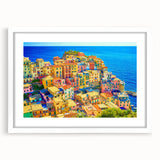 Framed wall art depicting a serene landscape village scene with vibrant colors and intricate details, featuring a white mat and sleek frame for elegant home decor.