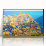 Framed acrylic wall art showcasing a stunning village landscape design with vibrant colors and intricate details, perfect for adding elegance to home decor.