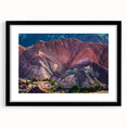Black-framed wall art featuring a serene village landscape design, complete with a white mat, ideal for enhancing home decor with a touch of nature.