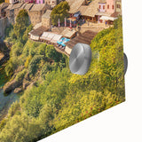 Close-up of an acrylic glass wall art piece showcasing a vibrant landscape and village design, emphasizing rich colors and intricate details, perfect for home decor.