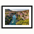 Framed wall art collection showcasing vibrant landscapes and charming villages, featuring a sleek black frame and white mat, perfect for home decor enhancement.