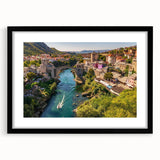 Framed wall art collection showcasing vibrant landscapes and charming villages, featuring a sleek black frame and white mat, perfect for home decor enhancement.