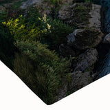 Vibrant close-up of a stretched canvas wall art piece showcasing a picturesque village landscape, featuring rich colors and intricate details, perfect for home decor.