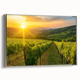 Framed canvas wall art showcasing a serene vineyard landscape design with rich green vines and rolling hills, elegantly bordered in silver for a modern touch.