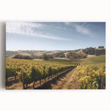Vibrant stretched canvas wall art showcasing a scenic vineyard landscape, featuring lush green vines under a clear blue sky, ideal for enhancing home decor.