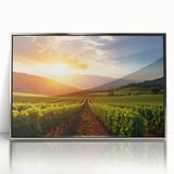 Framed acrylic wall art featuring a picturesque vineyard landscape design with vibrant green grapevines and rolling hills, presented in a sleek silver frame. Ideal for enhancing home decor or wine-themed spaces.
