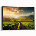 Framed canvas wall art depicting a serene vineyard landscape with lush green vines and rolling hills, presented in a sleek black frame, ideal for home decor.
