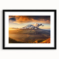 Framed black wall art featuring a stunning volcano landscape design with a matte finish, ideal for modern home decor and art enthusiasts. The piece showcases vibrant colors and intricate details, making it a striking focal point for any room.