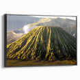Framed canvas wall art depicting a vibrant volcano landscape with bold colors, showcasing dramatic lava flows and a dynamic sky, perfect for home decor.