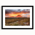 Framed black wall art featuring a vibrant volcano landscape design, showcasing rich colors and intricate details, perfect for modern home decor.