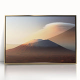 Framed wall art featuring a vibrant volcano landscape design with gold accents, perfect for modern home decor. The acrylic frame enhances the artwork's colors and details.