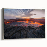 Framed canvas wall art depicting a vibrant volcano landscape with lush greenery and dramatic skies, set in a sleek silver frame, perfect for modern decor.