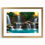 Framed wall art showcasing a serene landscape waterfall scene, featuring natural hues of blue and green, accented with a gold frame and mat, ideal for home decor.