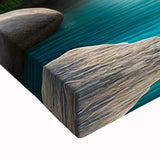 Close-up of a vibrant stretched canvas artwork depicting a serene waterfall surrounded by lush greenery, showcasing intricate details and rich colors, perfect for home decor.